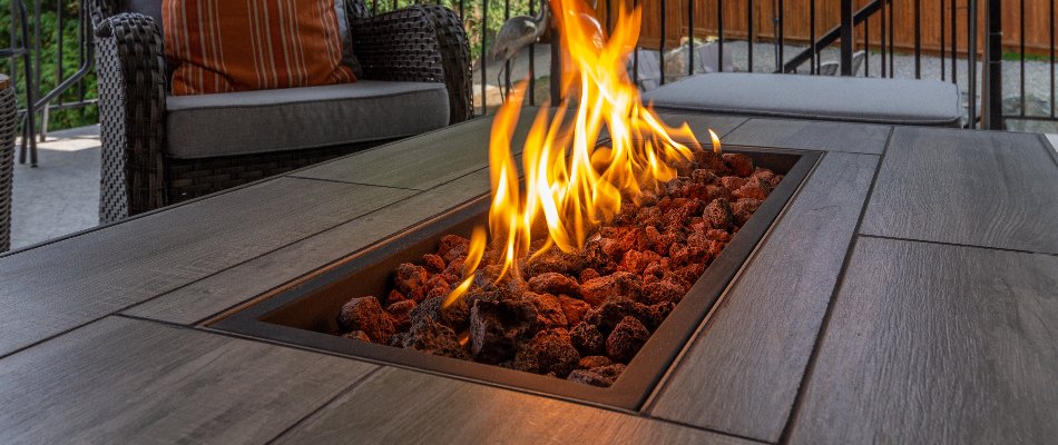 Closeup of a flame on a fire table in Chevy Chase, MD.