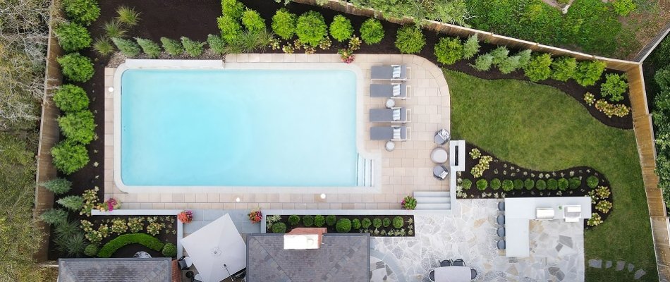 Aerial photo of a pool with landscaping in Overland Park, KS.