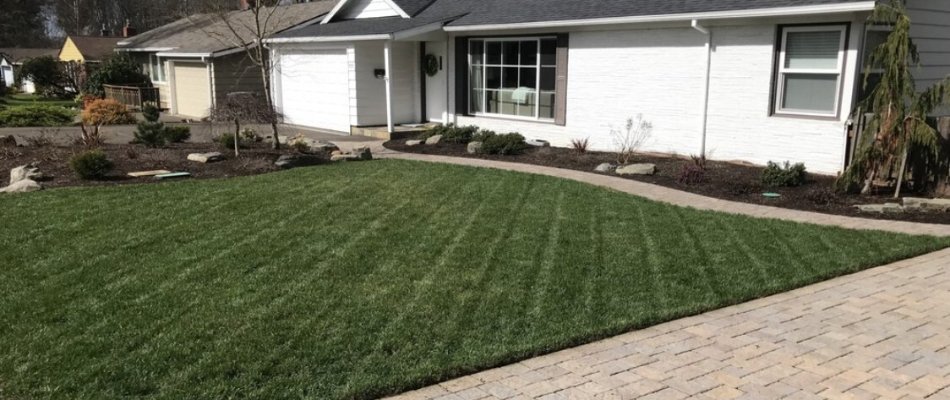 House with neatly mowed grass in Gresham, OR.
