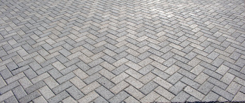 Herringbone paver pattern on a property in Matthews, NC.