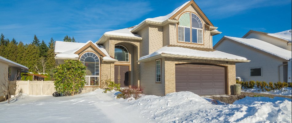 Residential property in Matthews, NC, with a lot of snow.
