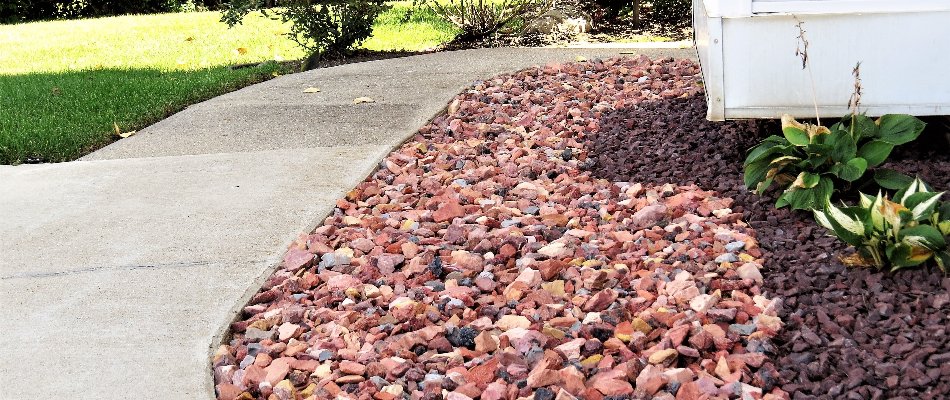 Rock ground cover near a sidewalk in Tulsa, OK.