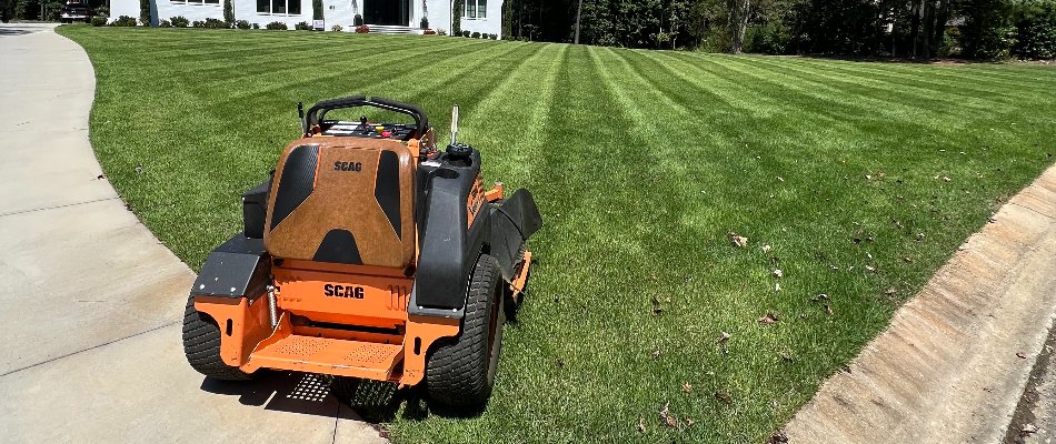 Lawn mower on freshly mowed grass in Matthews, NC.