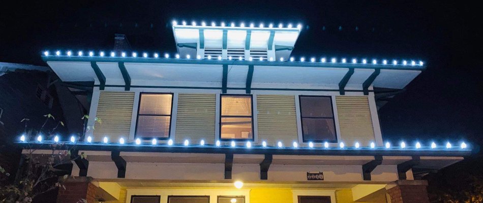 House in Tulsa, OK, with cool white Christmas lights.