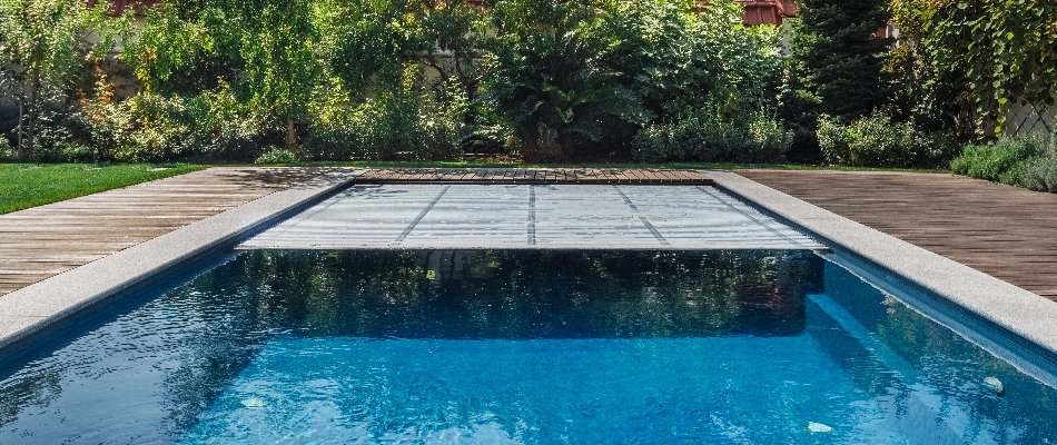 Pool in Bridgehampton, NY, with automatic cover.