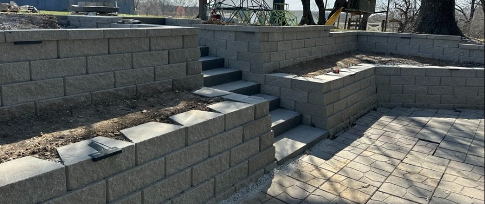 Retaining wall and outdoor fireplace in Waukee, IA.