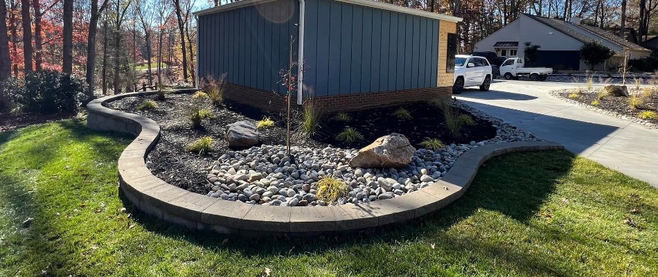 Retaining wall with a raised planter bed in Matthews, NC.