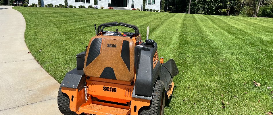 Lawn mower on newly mowed grass in Matthews, NC.