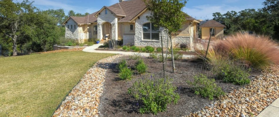Nice landscaping in front of a residential property in Canyon Lake, TX.