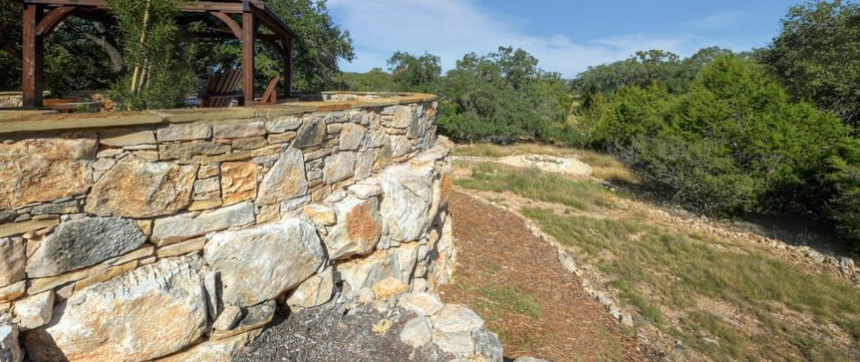 Retaining wall on a sloped property in Canyon Lake, TX.